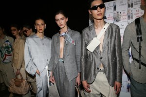 Backstage at Emporio Armani RTW Spring 2022