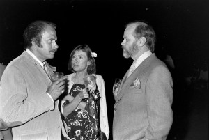(L-R) John Foreman, Joan Didion, and John Gregory Dunne attend a party, celebrating the release of Harriet Frank Jr.'s novel "Single," in Los Angeles, California,1977.