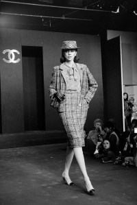 Jodie Foster poses on the runway in a look from Chanel's RTW Spring 1980 collection designed by Philippe Guibourge, who began as artistic director in 1977.