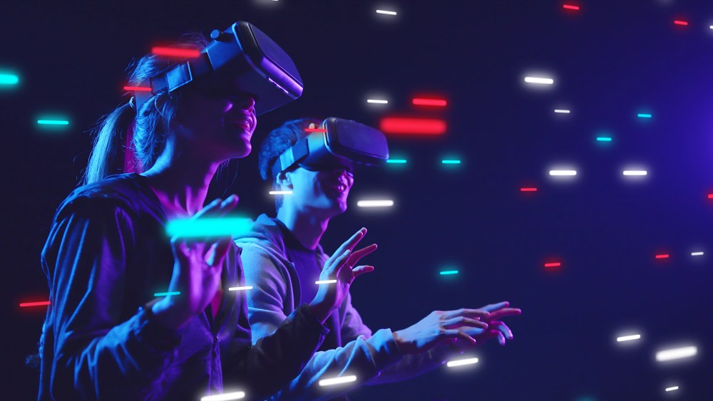 Metaverse VR virtual reality game playing, man and woman play metaverse virtual digital technology game control with VR goggle