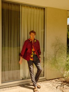 Jil Sander’s leather shirt jacket; Loewe’s silk shirt and sandals; Brioni’s wool and silk blend pants. David Yurman ring.