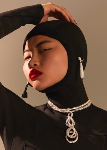 Yeprem’s 18-karat white gold white diamond necklace. De Beers Jewellers’ Talisman rough and pavé 26.95-carat diamond drop earrings set in 18-karat white gold. Billabong wetsuit.