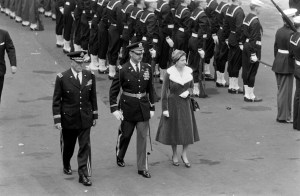 Queen Elizabeth II is greeted by the United States Armed Forces during a visit to Chicago, Illinois in 1959.