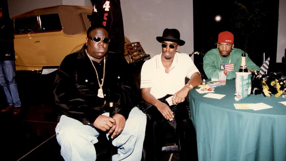 Notorious B.I.G, Sean Combs and producer Stevie J at the Peterson Vibe Magazine Party.