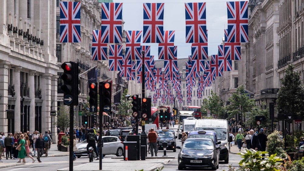 Union Flags hanging high above Regent Street in celebration of Queen Elizabeth II's Platinum Jubilee.