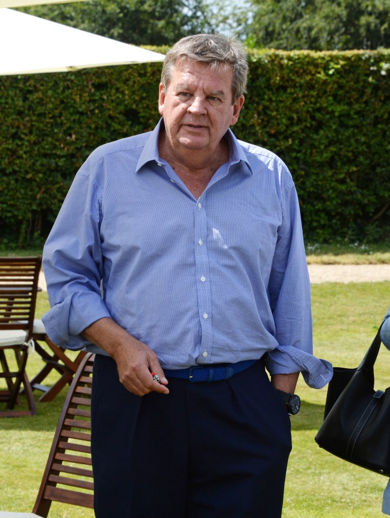 CHICHESTER, ENGLAND - JUNE 29: Johann Rupert attends the Cartier Style & Luxury Lunch at the Goodwood Festival of Speed on June 29, 2014 in Chichester, England. (Photo by David M. Benett/Getty Images)