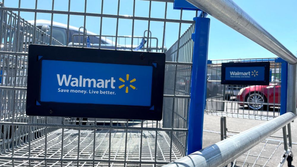ROHNERT PARK, CALIFORNIA - AUGUST 04: Shopping carts sit in the parking lot of a Walmart store on August 04, 2022 in Rohnert Park, California. Walmart plans to lay off hundreds of corporate employees in a restructuring effort after the retailer cut its profit outlook for the second quarter and the remainder of the year. (Photo by Justin Sullivan/Getty Images)