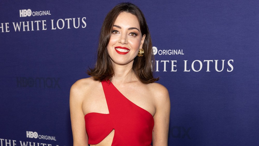 Aubrey Plaza wears red stella mccartney dress at the season two premiere of HBO Original Series "The White Lotus" held at Goya Studios on Oct. 20, 2022 in Los Angeles.