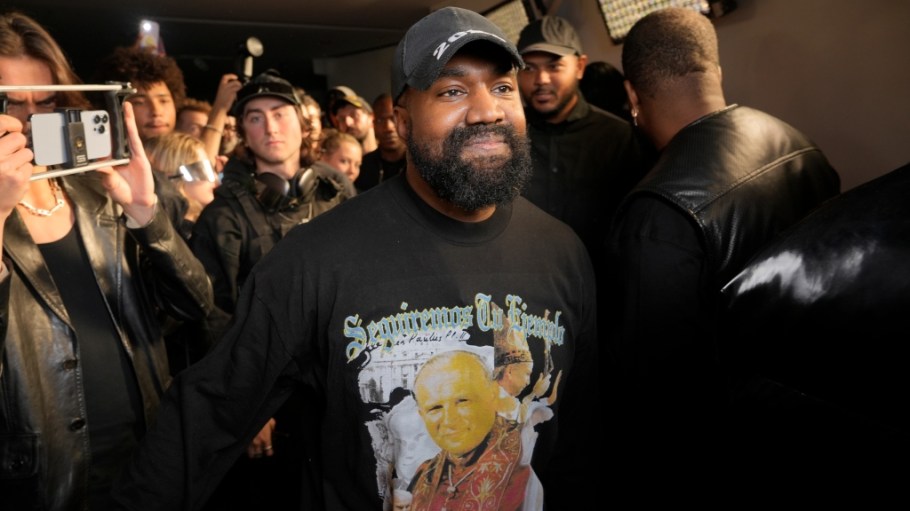 Designer-entrepreneur Kanye West continued to slam his former collaborator at his show at Paris Fashion Week.