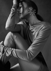 Alexandre Vauthier’s stretch jersey dress, leggings, gloves and boots. Boucheron’s Serpent Bohème Solarité multimotif hoop earrings, set with round diamonds, on yellow gold.