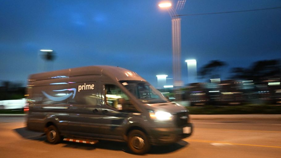 An Amazon Prime delivery van drives to Amazon.com Inc. delivery hub in the late evening of Amazon Prime Day, July 12, 2022 in Culver City, California.
