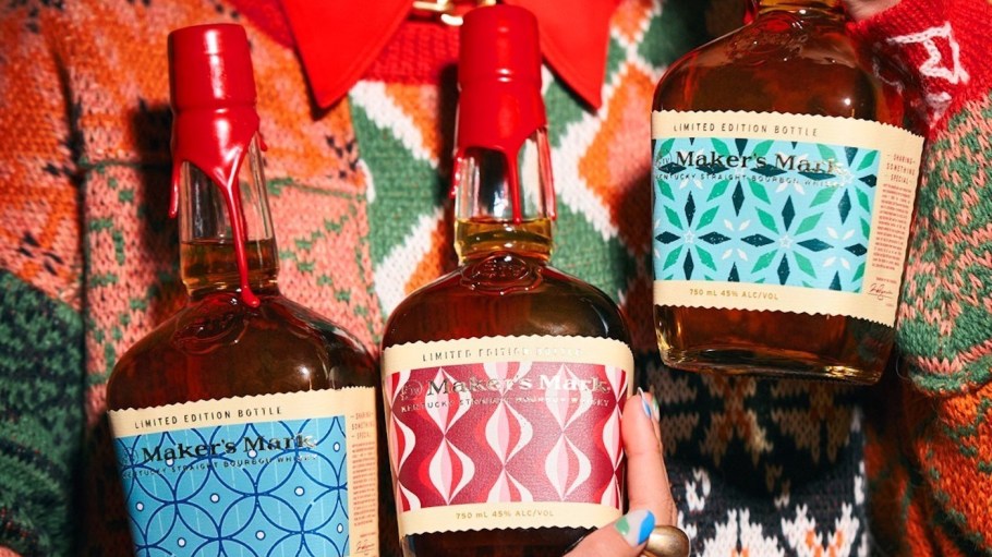 The Endery x Maker's Mark sweater with Maker's Mark holiday bottles.