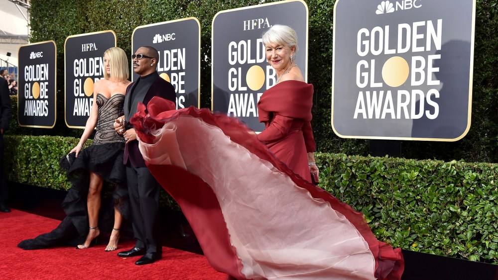 Paige Butcher, Eddie Murphey, and Helen Mirren at the 77th Annual Golden Globe Awards, 2020.