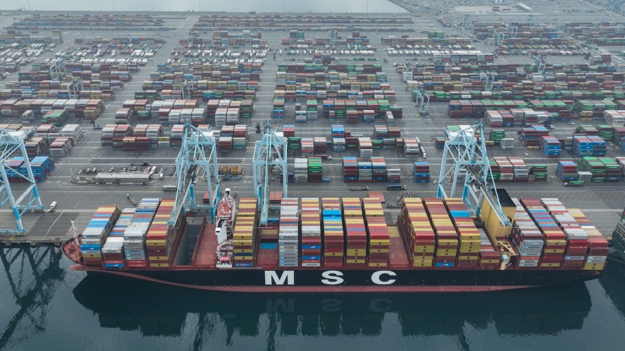 Aerial view of containers and cargo ships at the Port of Los Angeles in San Pedro, California.
