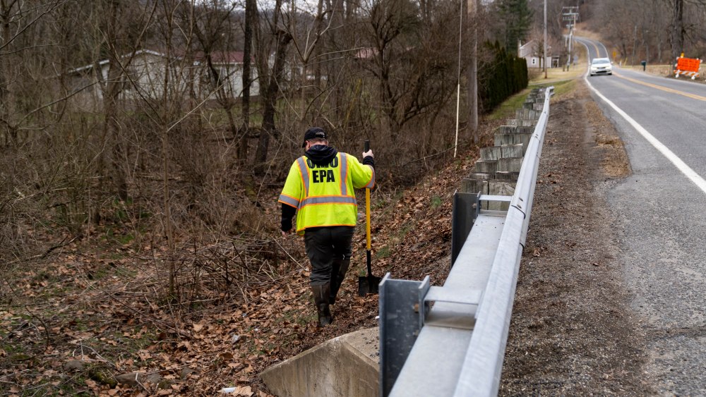 Ohio EPA Emergency Response checks for chemicals that have settled at the bottom of Leslie Run creek on February 20, 2023, following the train derailment on in East Palestine, Ohio.