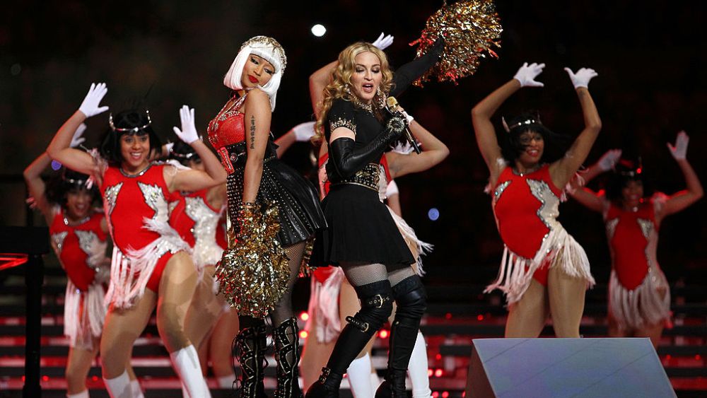 INDIANAPOLIS, IN - FEBRUARY 05:  Singer Madonna (R) performs with Nicki Minaj during the Bridgestone Super Bowl XLVI Halftime Show at Lucas Oil Stadium on February 5, 2012 in Indianapolis, Indiana.  (Photo by Al Bello/Getty Images)