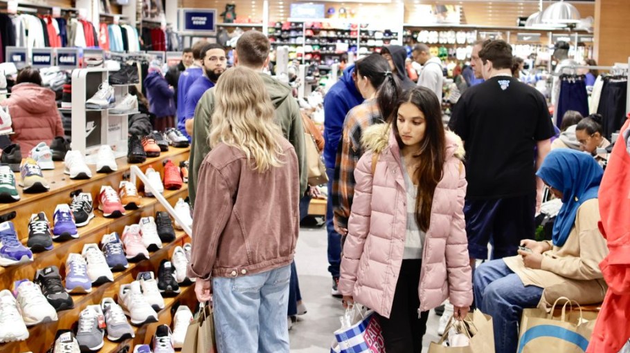 Consumers are still spending, but beneath the surface, they're stressed.
