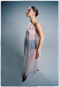 Prada’s nylon and lace dress and silk shorts. No.21 shoes; Mateo pearl earrings; The M Jewelers eternity bands.
