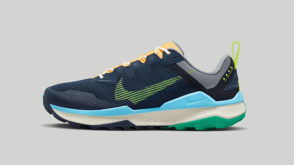 Running shoe with blue and green sole