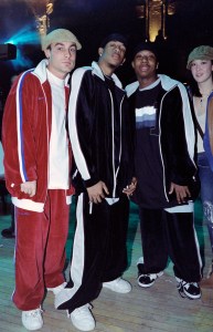 Guests in velour track suits attend MTV Fashionably Loud Urban Sportswear Fashion Show and Hip Hop concert, 2002, New York City.