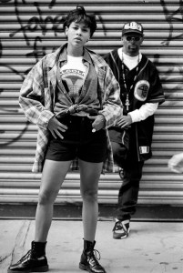 Spike Lee poses with a model in his 40Acres and A Mule by Spike Lee Spring 1993 Sportswear Collection.