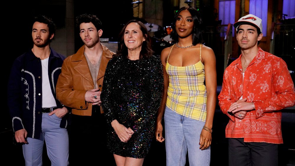 (L-R) Kevin Jonas, Nick Jonas, Joe Jonas, Molly Shannon and Ego Nwodim during promos for the April 8 episode of "Saturday Night Live."
