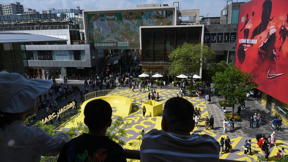Shoppers at Beijing's Taikoo Li Sanlitun shopping mall on the second day of the five-day Labour Day holiday.
