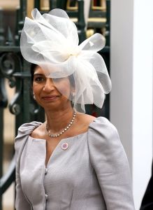 Britain's Home Secretary Suella Braverman arrives at Westminster Abbey in central London on May 6, 2023, ahead of the coronations of Britain's King Charles III and Britain's Camilla, Queen Consort. - The set-piece coronation is the first in Britain in 70 years, and only the second in history to be televised. Charles will be the 40th reigning monarch to be crowned at the central London church since King William I in 1066. Outside the UK, he is also king of 14 other Commonwealth countries, including Australia, Canada and New Zealand. Camilla, his second wife, will be crowned queen alongside him, and be known as Queen Camilla after the ceremony. (Photo by Andrew Milligan / POOL / AFP) (Photo by ANDREW MILLIGAN/POOL/AFP via Getty Images)