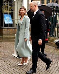 LONDON, ENGLAND - MAY 06: Ukrainian first lady Olena Zelenska and Ukrainian Prime Minister Denys Shmyhal arrive at Westminster Abbey ahead of the Coronation of King Charles III and Queen Camilla on May 6, 2023 in London, England. The Coronation of Charles III and his wife, Camilla, as King and Queen of the United Kingdom of Great Britain and Northern Ireland, and the other Commonwealth realms takes place at Westminster Abbey today. Charles acceded to the throne on 8 September 2022, upon the death of his mother, Elizabeth II. (Photo by Andrew Milligan - WPA Pool/Getty Images)