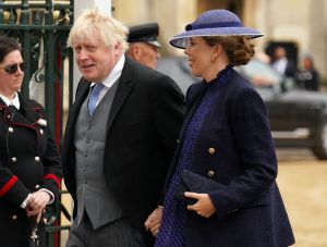 Former prime minister Boris Johnson and his wife Carrie Johnson arrive at Westminster Abbey in central London on May 6, 2023, ahead of the coronations of Britain's King Charles III and Britain's Camilla, Queen Consort. - The set-piece coronation is the first in Britain in 70 years, and only the second in history to be televised. Charles will be the 40th reigning monarch to be crowned at the central London church since King William I in 1066. Outside the UK, he is also king of 14 other Commonwealth countries, including Australia, Canada and New Zealand. Camilla, his second wife, will be crowned queen alongside him, and be known as Queen Camilla after the ceremony. (Photo by Andrew Milligan / POOL / AFP) (Photo by ANDREW MILLIGAN/POOL/AFP via Getty Images)