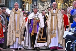 LONDON, ENGLAND - MAY 06: Britain's King Charles III wearing the Imperial state Crown carrying the Sovereign's Orb and Sceptre leaves Westminster Abbey after the Coronation Ceremonies on May 6, 2023 in London, England. The Coronation of Charles III and his wife, Camilla, as King and Queen of the United Kingdom of Great Britain and Northern Ireland, and the other Commonwealth realms takes place at Westminster Abbey today. Charles acceded to the throne on 8 September 2022, upon the death of his mother, Elizabeth II. (Photo by Ben Stansall  - WPA Pool/Getty Images)