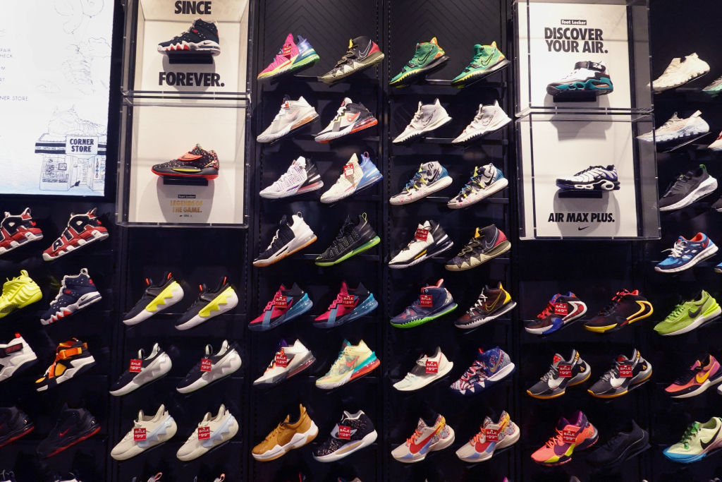 CHICAGO, ILLINOIS - AUGUST 02: Athletic footwear is offered for sale at a Foot Locker store on August 02, 2021 in Chicago, Illinois. Foot Locker Inc. has announced plans to buy athletic retailer WSS for $750 million and Atmos, a Japan-based streetwear and sneaker company, for $360 million. (Photo by Scott Olson/Getty Images)