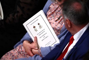 LONDON, ENGLAND - MAY 06: A general view of guests looking at their programmes inside Westminster Abbey ahead of the Coronation of King Charles III and Queen Camilla on May 06, 2023 in London, England. The Coronation of Charles III and his wife, Camilla, as King and Queen of the United Kingdom of Great Britain and Northern Ireland, and the other Commonwealth realms takes place at Westminster Abbey today. Charles acceded to the throne on 8 September 2022, upon the death of his mother, Elizabeth II. (Photo by Gareth Cattermole/Getty Images)