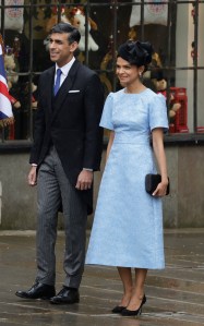 LONDON, ENGLAND - MAY 06: British Prime Minister Rishi Sunak and Akshata Murthy arrive at the Coronation of King Charles III and Queen Camilla on May 06, 2023 in London, England. The Coronation of Charles III and his wife, Camilla, as King and Queen of the United Kingdom of Great Britain and Northern Ireland, and the other Commonwealth realms takes place at Westminster Abbey today. Charles acceded to the throne on 8 September 2022, upon the death of his mother, Elizabeth II. (Photo by Jeff J Mitchell/Getty Images)