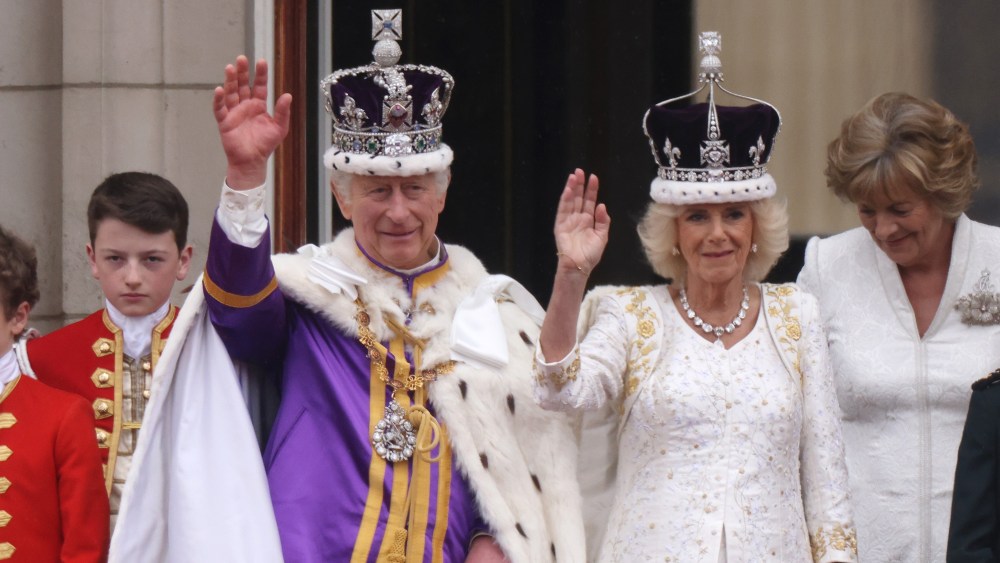 King Charles III and Queen Consort Camilla can be seen on the Buckingham Palace balcony following the coronation on May 6.