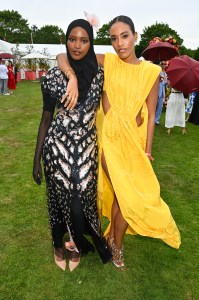 EGHAM, ENGLAND - JUNE 18: Fadhi Mohamed and Adrienne Everett attend the Cartier Queen's Cup Polo at Guards Polo Club on June 18, 2023 in Egham, England. (Photo by Dave Benett/Getty Images for Cartier)