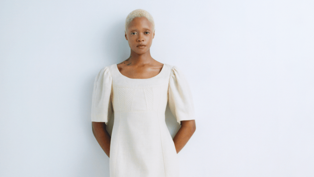 A white three-quarter-length sleeved dress from Chloé's spring 2023 line made for circularity and with digital IDs in mind.