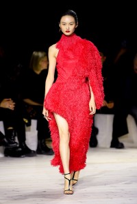 Model on the runway at Alexander McQueen Ready To Wear Spring 2024 held at Careau du Temple on September 30, 2023 in Paris, France.