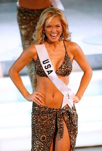 LOS ANGELES, CA - JULY 23:  Miss USA Tara Conner is selected as a top ten finalist during the Miss Universe 2006 pageant at the Shrine Auditorium on July 23, 2006 in Los Angeles, California.  (Photo by Stephen Shugerman/Getty Images)