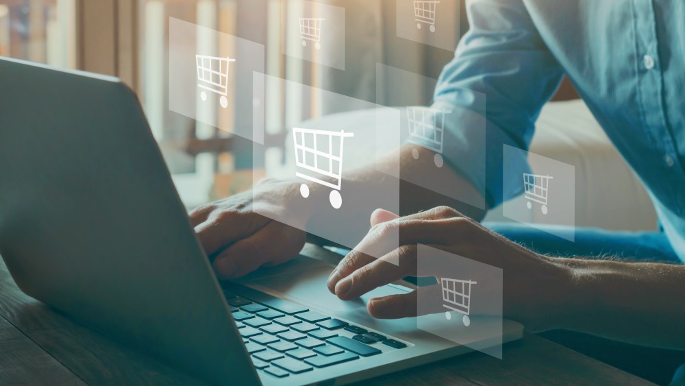 order in online store, shopping on internet, concept on virtual screen with hands typing on keyboard