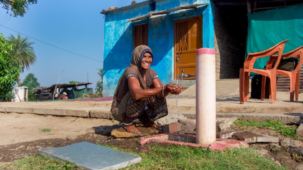 Collecting water in India.