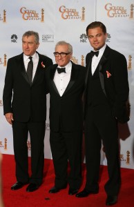 Oscar-winning director Martin Scorsese (C) stands with US actors Leondardo DiCaprio (R) and Robert De Niro (L), who presented Scorsese the Golden Globes Cecil B. DeMille Award for his "outstanding contribution to the entertainment field" during the 67th Golden Globe Awards on January 17, 2010 in Beverly Hills, California. The veteran film-maker, director of classic films including "Raging Bull," "Goodfellas" and "The Aviator," has already received two best director Globes during his career for "The Departed" and "Gangs of New York."   AFP PHOTO / Valerie MACON (Photo credit should read VALERIE MACON/AFP via Getty Images)