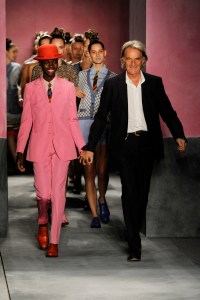 Designer Paul Smith (R) and models on the runway after the designer's spring 2010 show at Claridge's.