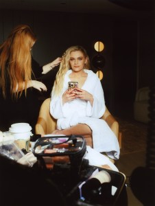 A look at Kelsea Ballerini getting ready for the Michael Kors Fall 2024 show.