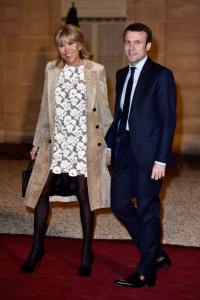 Minister of Economy Emmanuel Macron  and Brigitte Macron arrive at The State Dinner in Honor Of King Willem-Alexander of the Netherlands and Queen Maxima on March 10, 2016 in Paris, France.