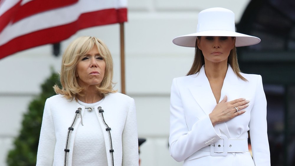 U.S. first lady Melania Trump welcomes French first lady Brigitte Macron, during an arrival ceremony at the White House April 24, 2018 in Washington, DC. Trump is hosting Macron for a two-day official visit that included dinner at George Washington's Mount Vernon, a tree planting on the White House South Lawn and a joint news conference.