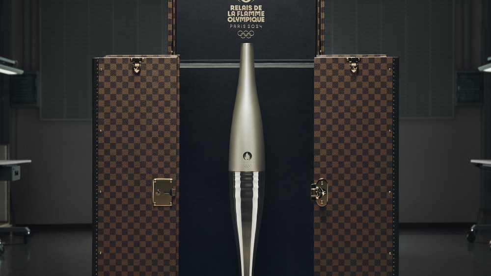 , louis vuitton trunks, medals and torches paris olympics 2024