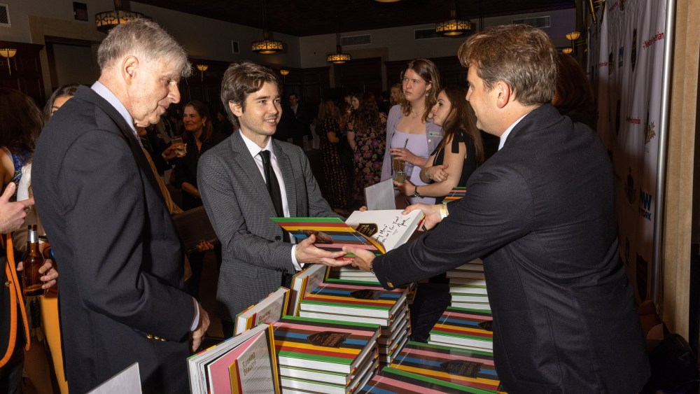 Boys in the Boat actor Luke Slattery meets author Jack Carlson at the New York Athetic Club event.