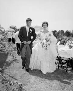 John F Kennedy and Jacqueline Kennedy at an outdoor reception, 1953.