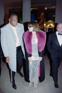 Andre Leon Talley, Anna Wintour, and David Shaffer attend the opening gala for an exhibit honoring late Italian designer Gianni Versace at the Metropolitan Museum of Art in New York City on December 8, 1997.
